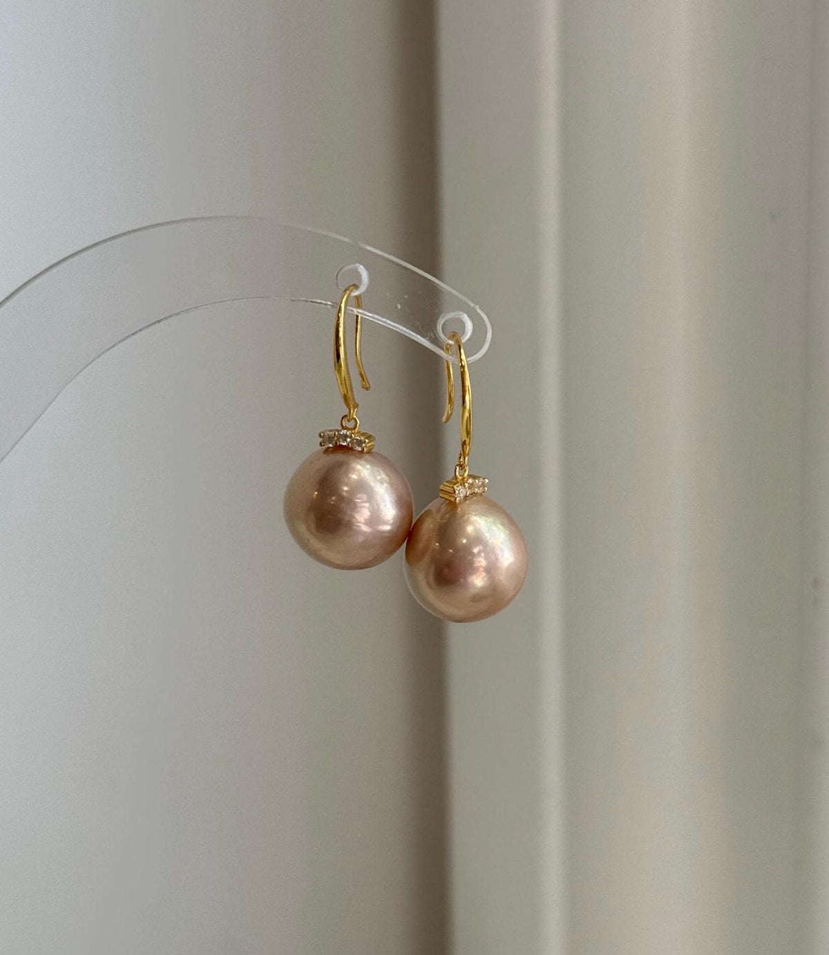 S925 sterling silver hook earrings with genuine 12mm rose champagne Edison pearls.