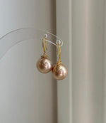 S925 sterling silver hook earrings with genuine 12mm rose champagne Edison pearls.