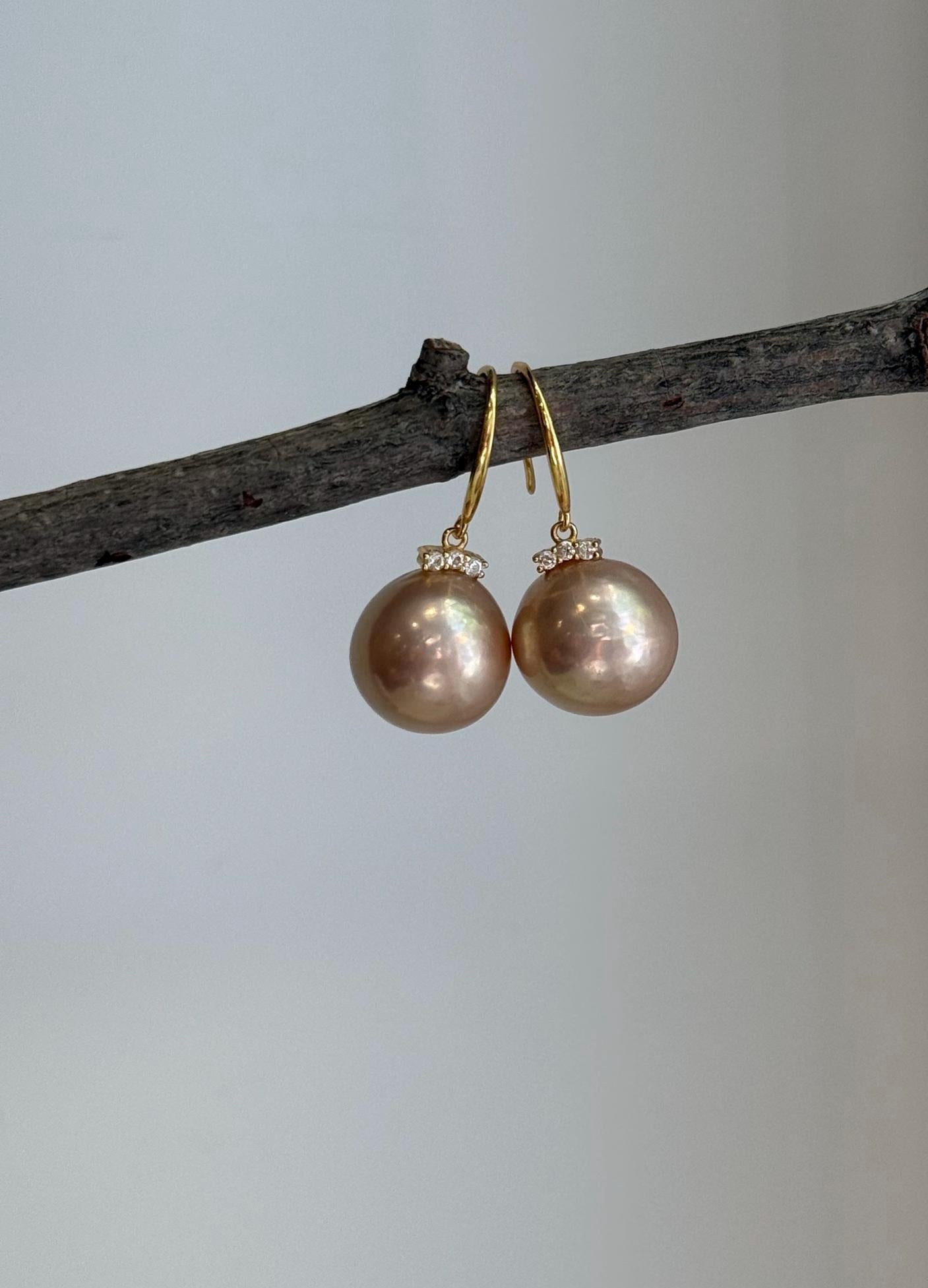 Rose champagne gold Edison pearl earrings with elegant minimalist hook design.
