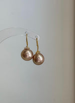 Elegant rose champagne Edison pearl hook earrings, a beautiful pearl jewelry gift.