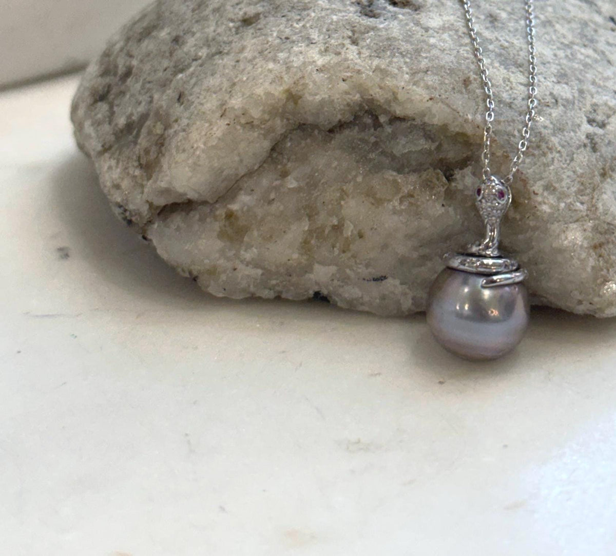 Elegant 11.8mm Tahitian saltwater pearl pendant with S925 sterling silver snake detail.