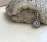 Elegant 11.8mm Tahitian saltwater pearl pendant with S925 sterling silver snake detail.