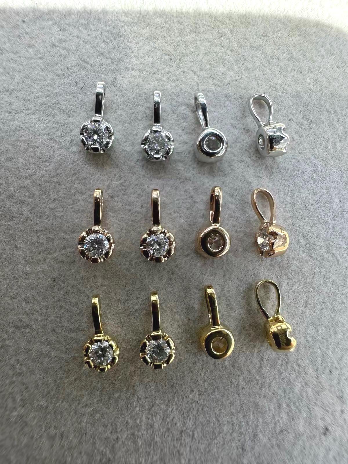 Moissanite charm size comparison featuring 0.05, 0.10, 0.20, 0.30 and 0.40 ct stones.