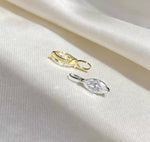 Au750 18K gold marquise moissanite charm featuring an elegant minimalist design.