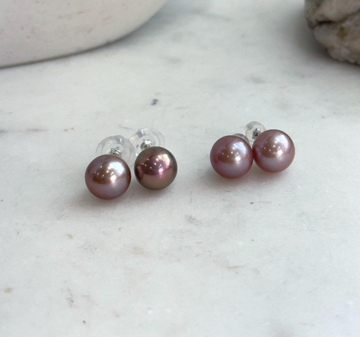 Genuine freshwater Edison pearl earrings featuring elegant 10.3mm mauve pearls with high luster.