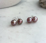 Genuine freshwater Edison pearl earrings featuring elegant 10.3mm mauve pearls with high luster.