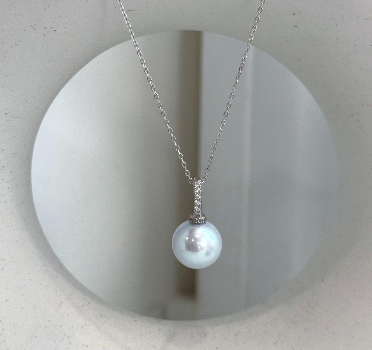Genuine Edison pearl necklace pendant featuring an 11.6mm pearl with intense mirror luster and elegant white silver tone.