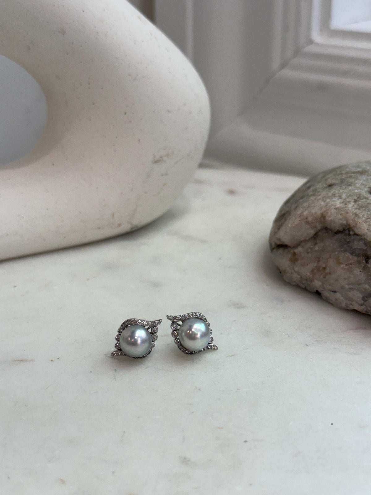 Elly’s genuine 8.8mm saltwater Akoya pearl earrings, an elegant blue silver pearl jewelry gift.