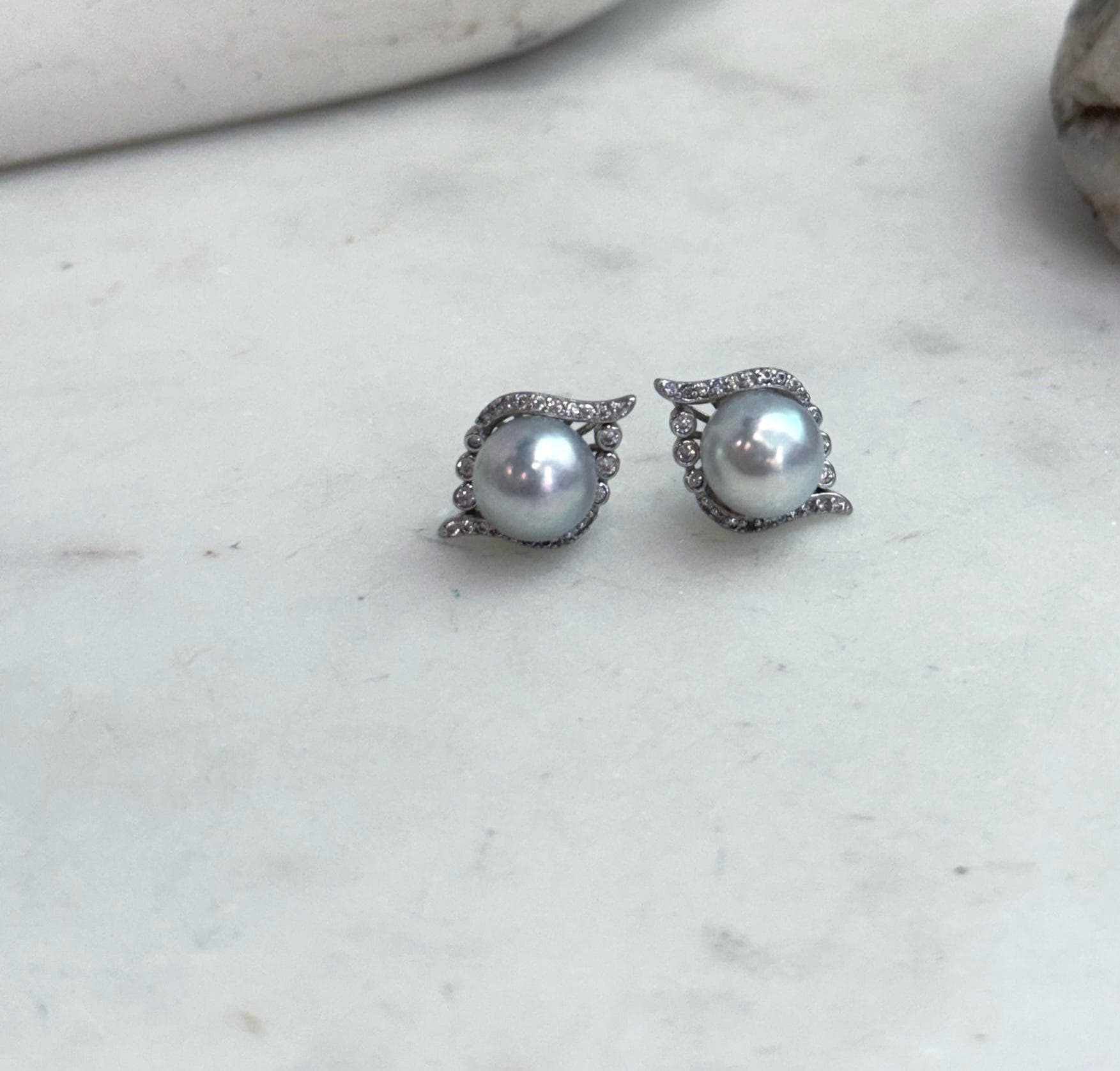 Elegant Akoya pearl earrings measuring approximately 1.7 × 1.2cm with S925 sterling silver.