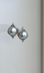 Luxury blue silver Akoya pearl earrings featuring genuine saltwater cultured pearls and bright reflective luster.
