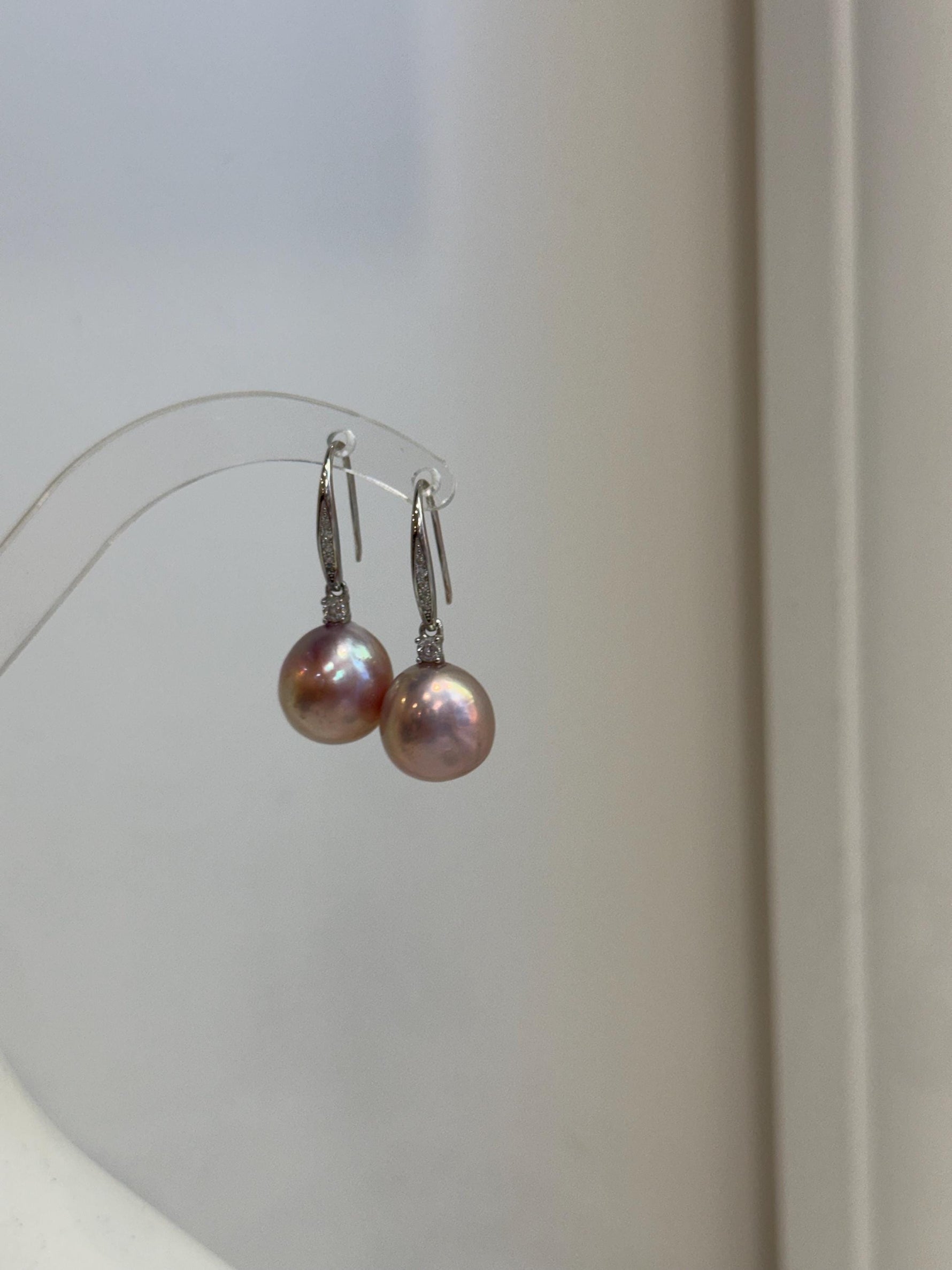 Luxury Edison pink gold pearl earrings with 12.2mm genuine freshwater pearls and extreme mirror luster.
