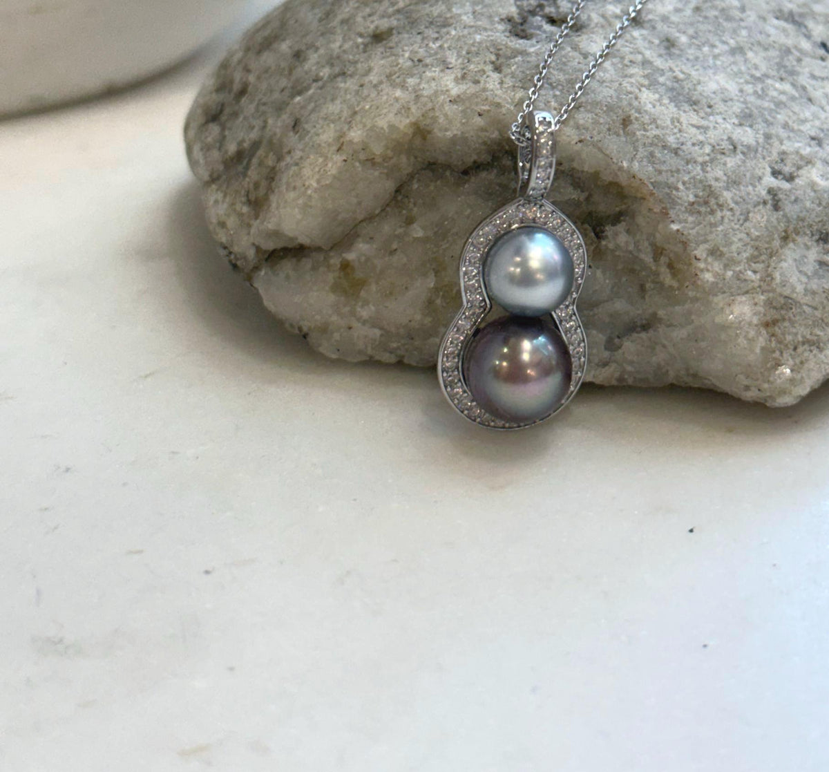 Elegant Tahitian pearl pendant designed with two naturally beautiful saltwater pearls.
