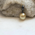 Genuine golden South Sea saltwater pearl pendant featuring a rich deep tea gold color.