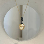Elegant golden South Sea pearl pendant with rich color and high reflective luster.