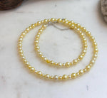 18.7-inch golden freshwater pearl necklace finished with an S925 sterling silver clasp.