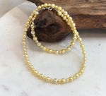Elegant small golden pearl necklace made with genuine freshwater cultured pearls.