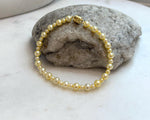 Elegant golden pearl bracelet finished with an S925 sterling silver clasp.