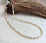 Golden silver pearl necklace finished with an S925 sterling silver clasp.