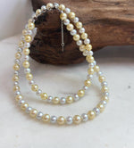 Small freshwater pearl necklace with beautiful shine and delicate graduated pearl sizes.