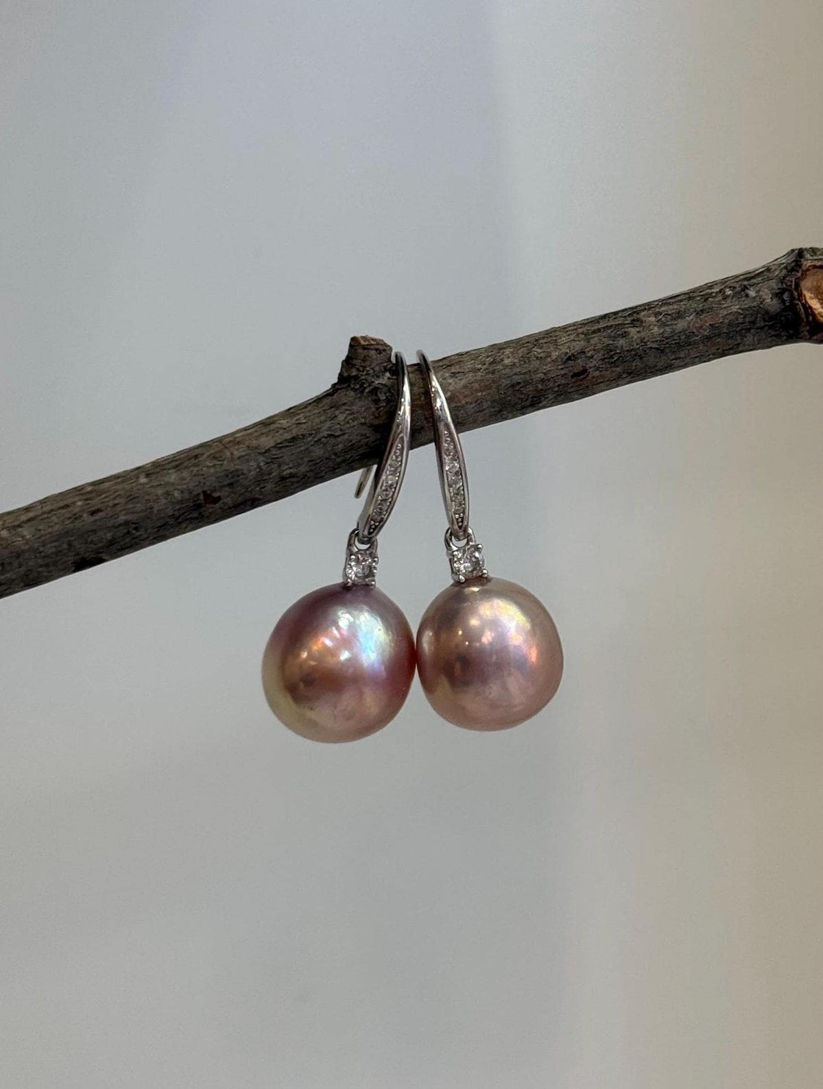 Genuine Edison pearl hook earrings with large 12.2mm pink gold pearls and S925 sterling silver.
