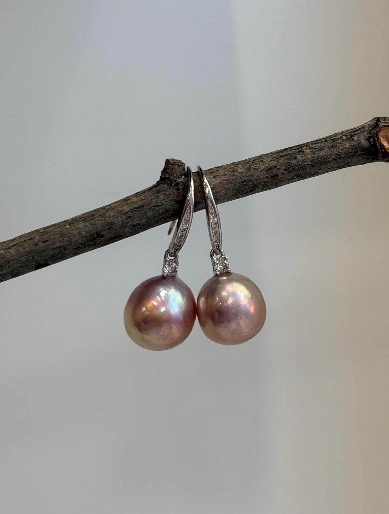 Genuine Edison pearl hook earrings with large 12.2mm pink gold pearls and S925 sterling silver.