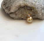 Elegant 10.7mm golden saltwater pearl pendant for women.