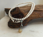 Genuine pearl necklace set featuring white freshwater, Tahitian and South Sea golden pearls.