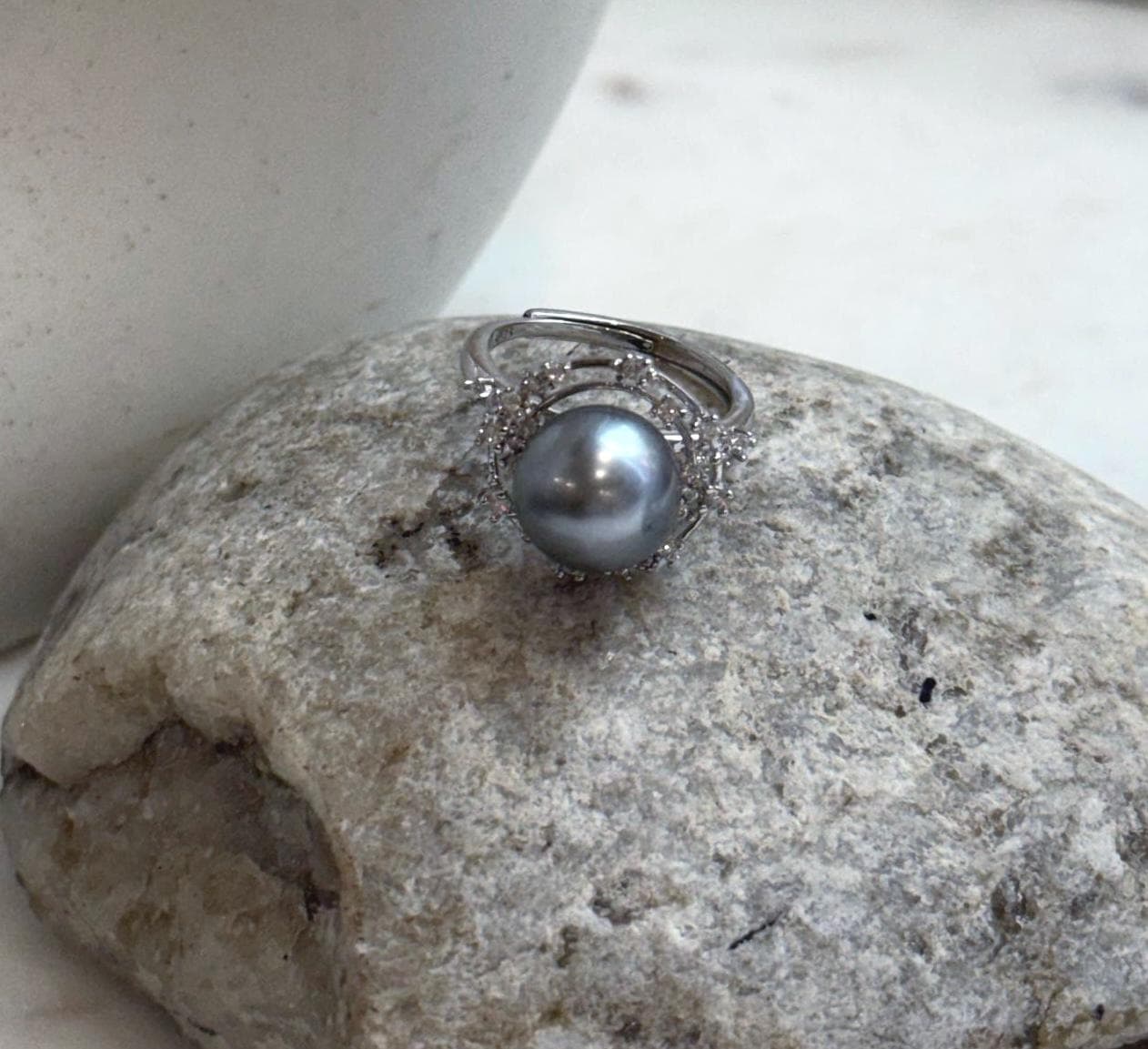 Genuine ocean pearl ring with bright reflective mirror-like luster