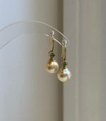 Elly’s 9.4mm South Sea ultra gold pearl hook earrings with extreme luster and S925 sterling silver.