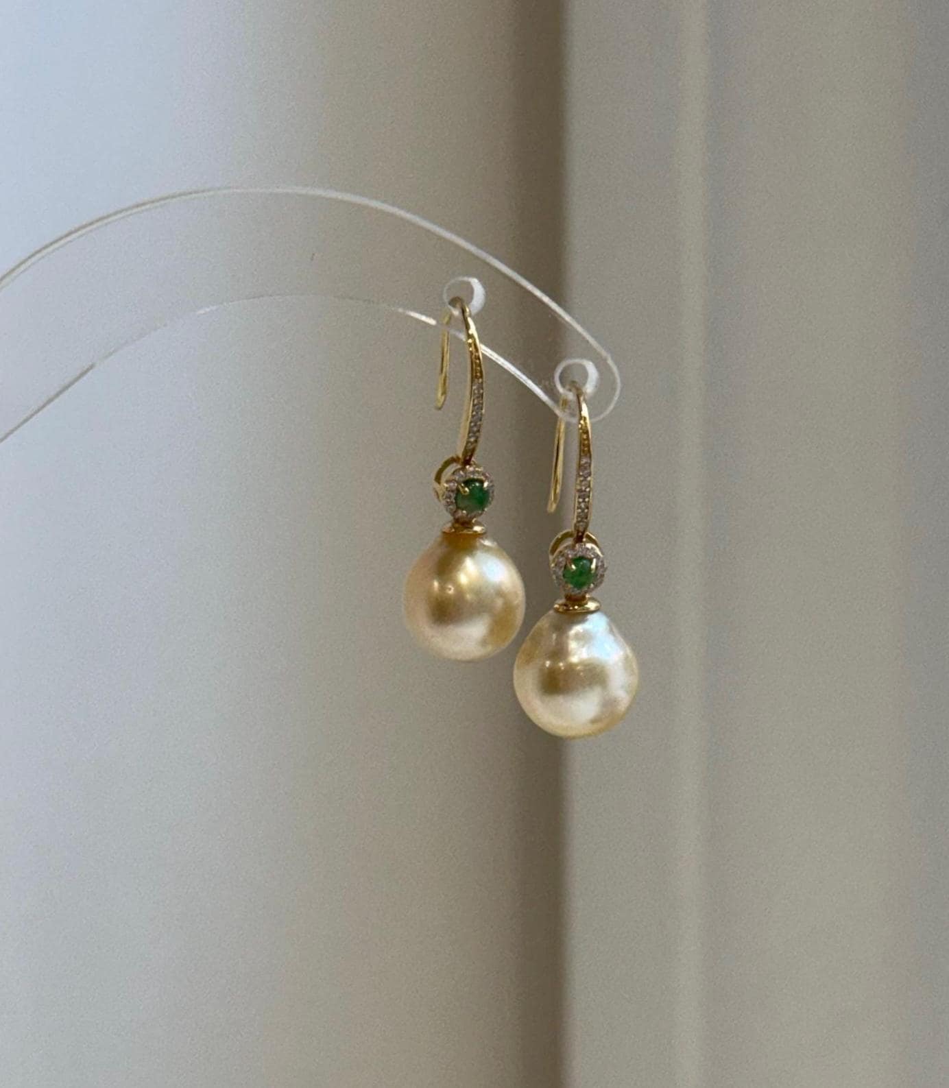 Elly’s 9.4mm South Sea ultra gold pearl hook earrings with extreme luster and S925 sterling silver.