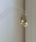 4. 4mm South Sea golden pearl hook earrings with extreme mirror-like luster and sterling silver.