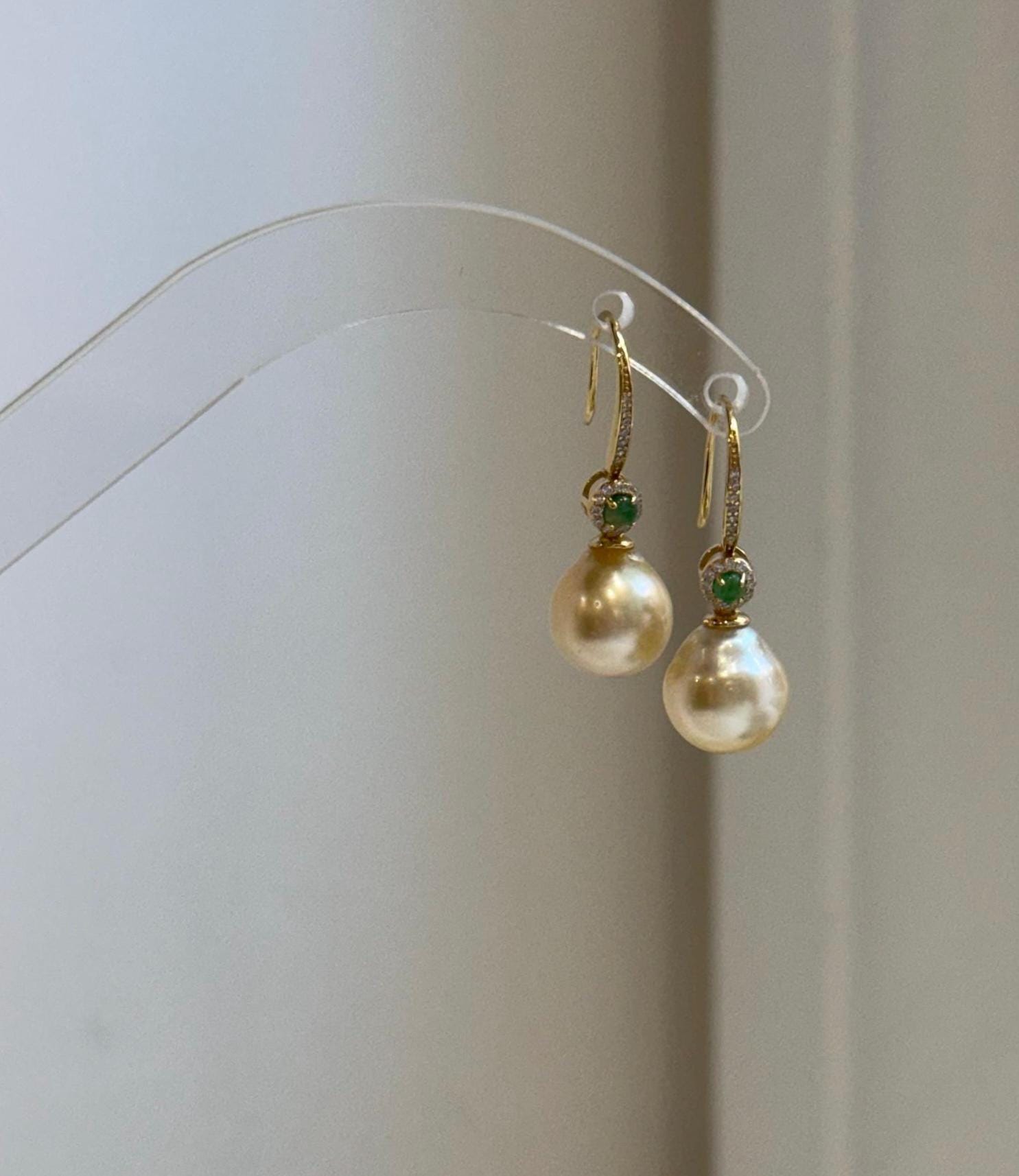4. 4mm South Sea golden pearl hook earrings with extreme mirror-like luster and sterling silver.