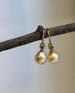 Genuine saltwater pearl earrings with rare ultra gold South Sea pearls and elegant hook design.