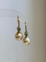 Elly’s South Sea gold pearl earrings with 9.4mm lustrous pearls and 2.6cm total height.
