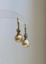 Minimalist South Sea golden pearl hook earrings with genuine 9.4mm saltwater pearls.