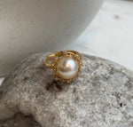 Natural South Sea saltwater pearl ring featuring a radiant golden pearl with exceptional mirror luster