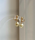 Elegant 2.3cm cat earrings featuring genuine South Sea gold pearls and S925 sterling silver settings.