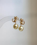 Cute cat pearl earrings with 9.2mm South Sea saltwater pearls, perfect for pearl jewelry lovers and cat lovers.