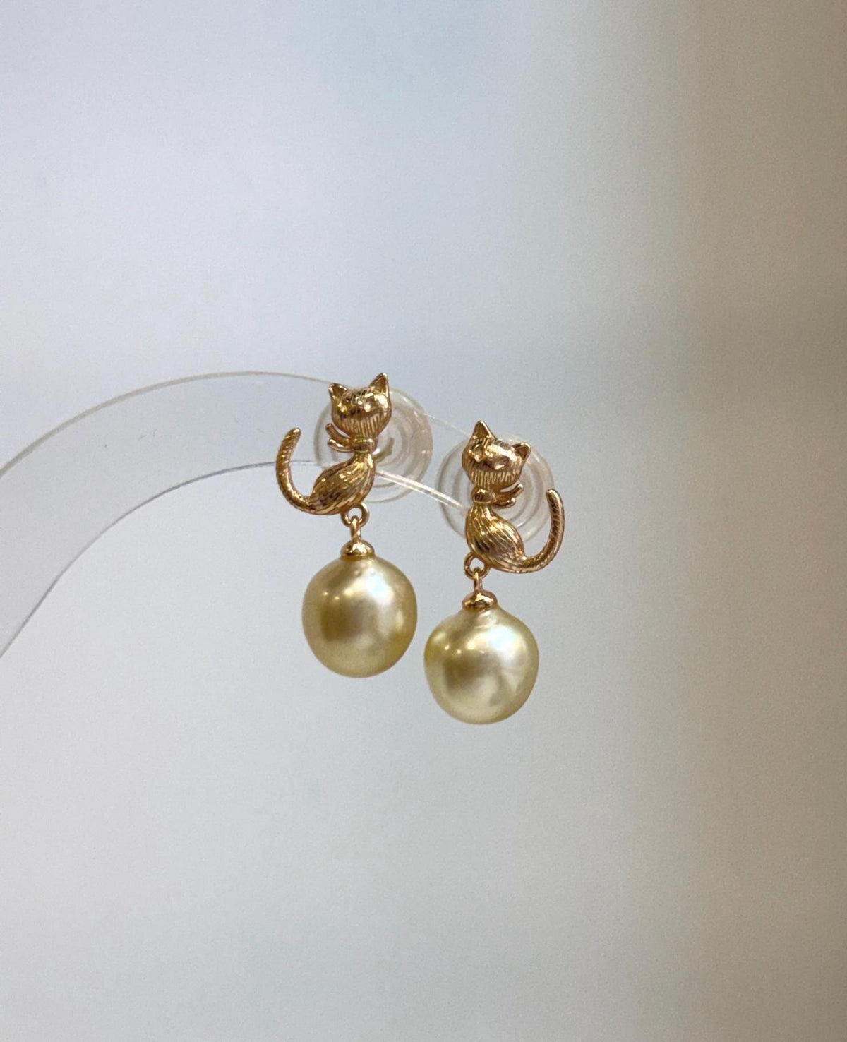 Cute cat pearl earrings with 9.2mm South Sea saltwater pearls, perfect for pearl jewelry lovers and cat lovers.