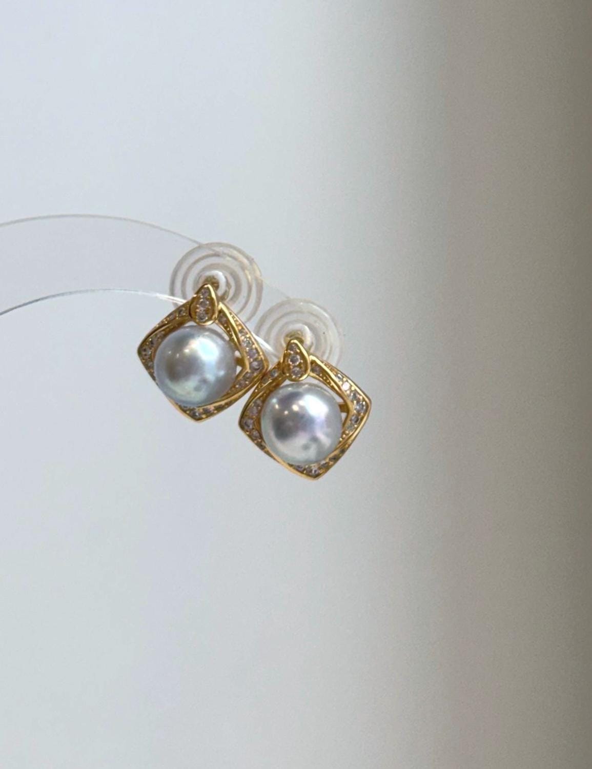 Ocean blue Akoya pearl earrings in S925 sterling silver setting measuring 1.4x1.5cm