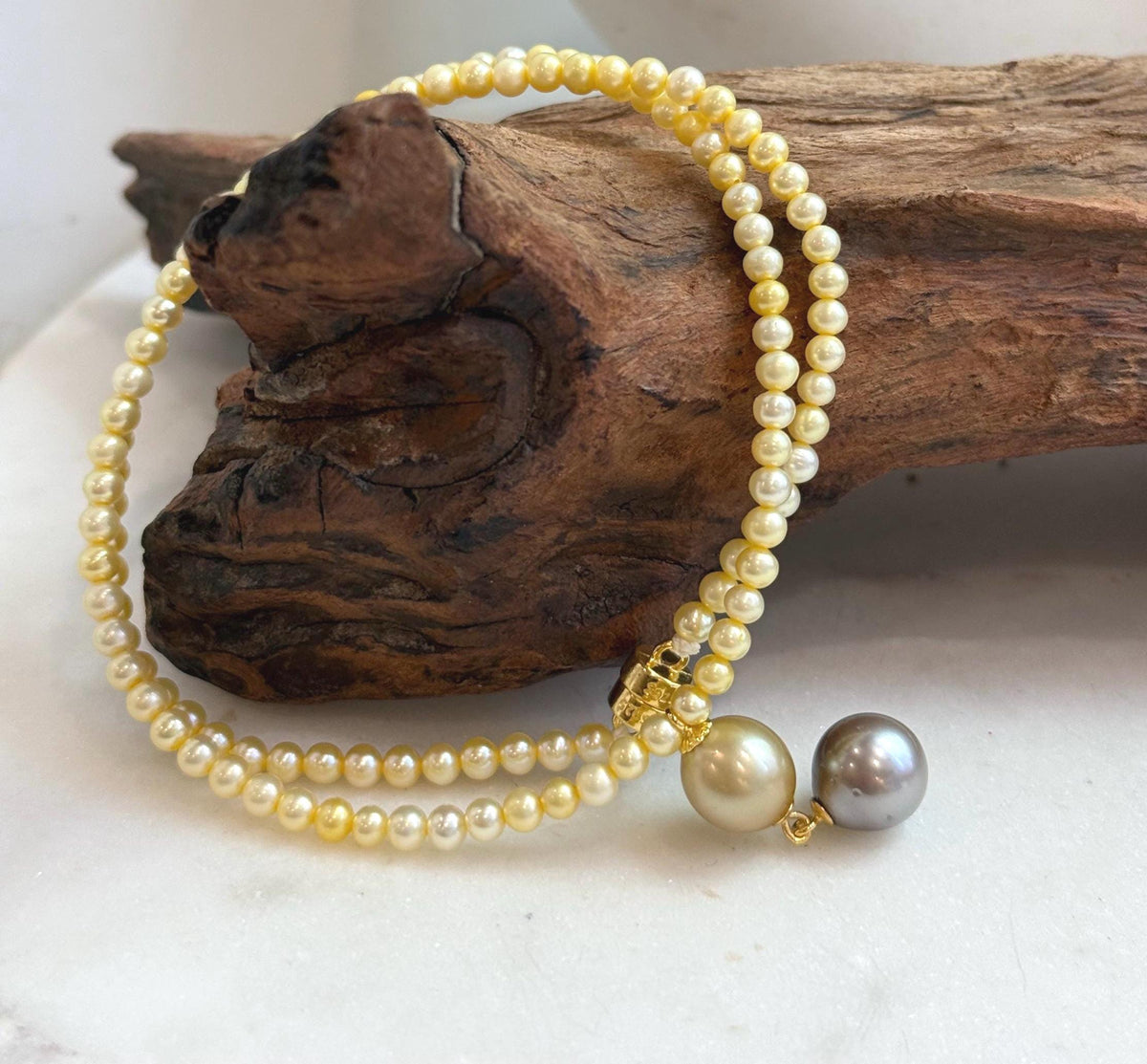 Elegant Tahitian and golden pearl drop necklace with S925 sterling silver details.