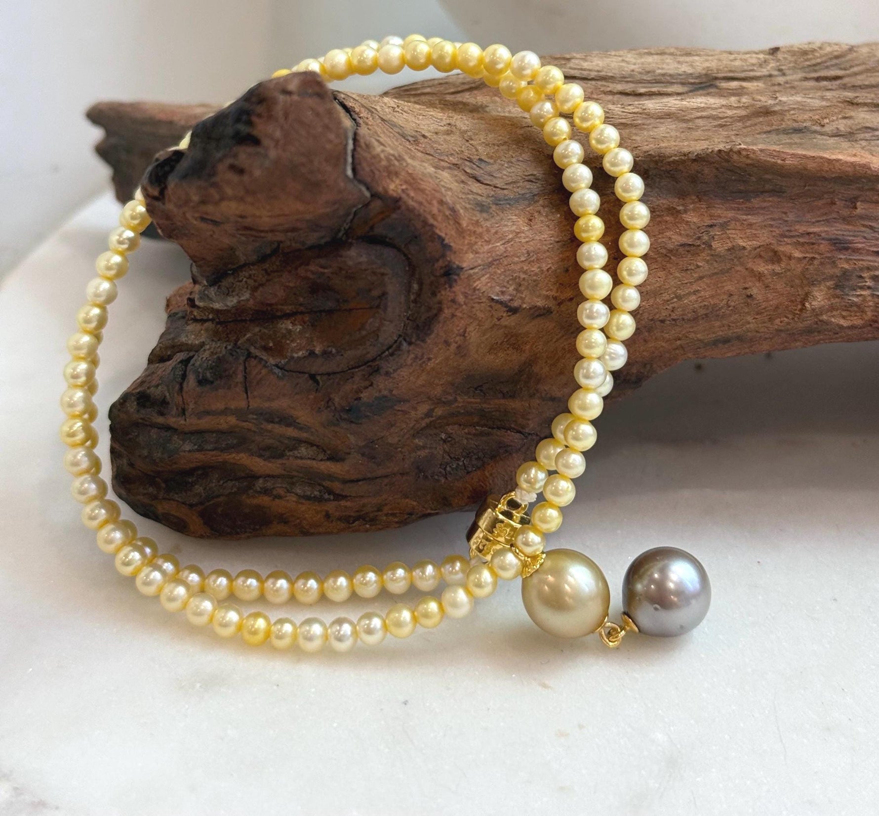 Elegant Tahitian and golden pearl drop necklace with S925 sterling silver details.