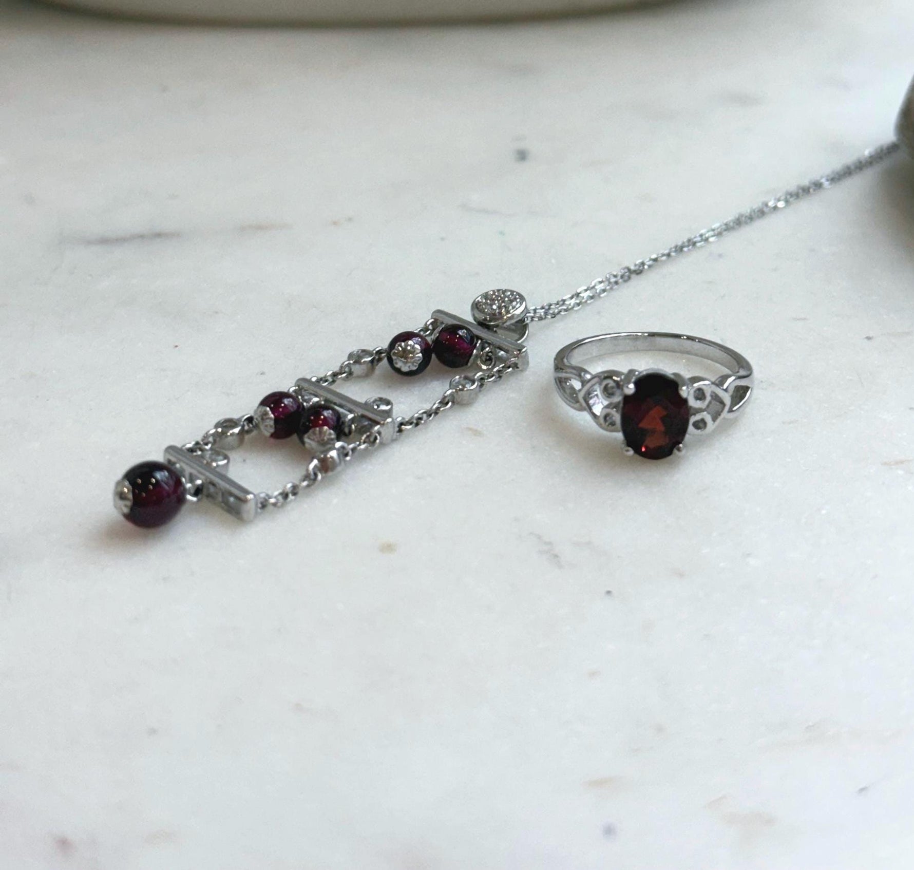 Deep red garnet gemstone jewelry crafted in sterling silver