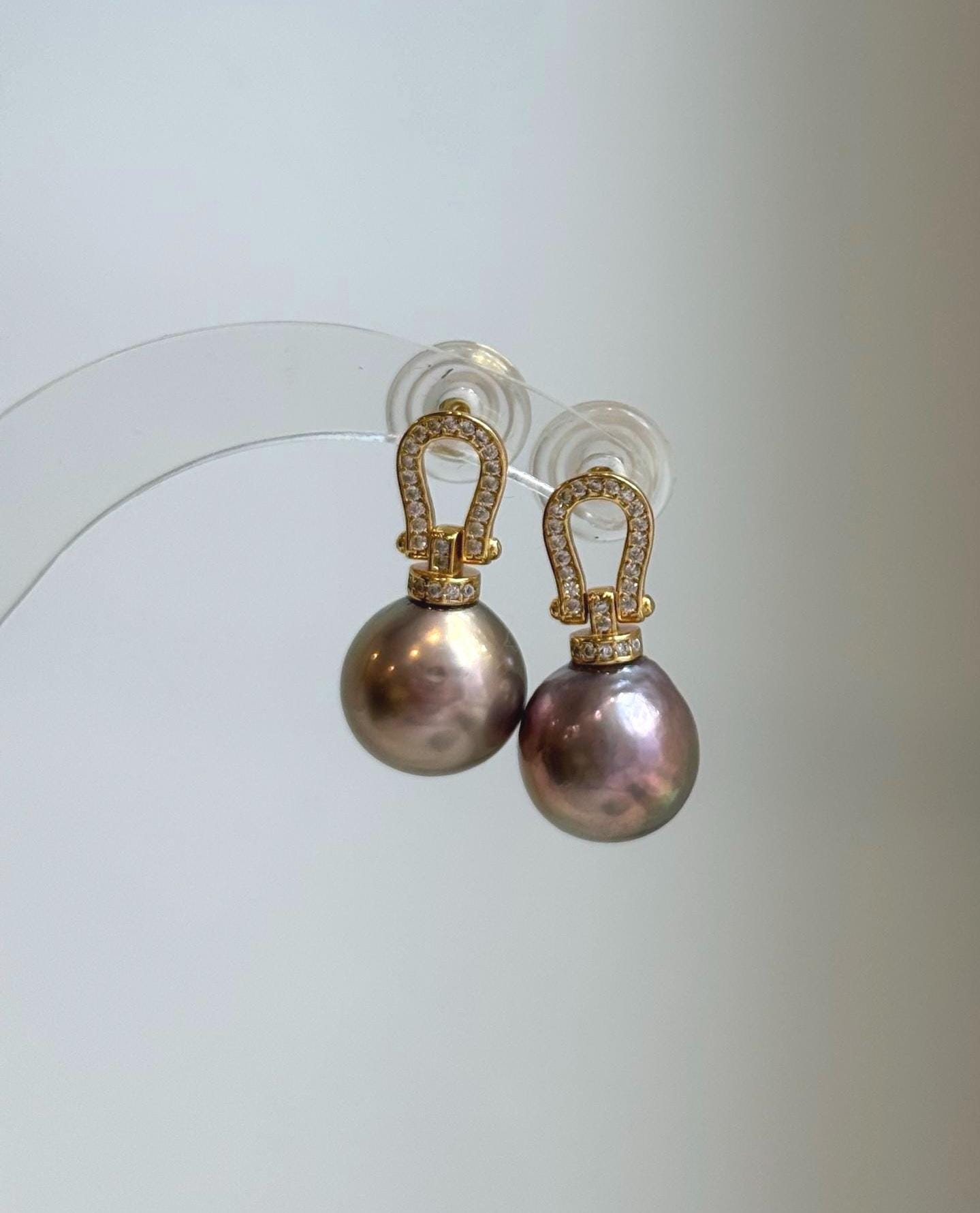 Elegant Edison freshwater pearl earrings set with S925 sterling silver.