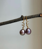 S925 sterling silver hook earrings featuring large genuine Edison pearls.