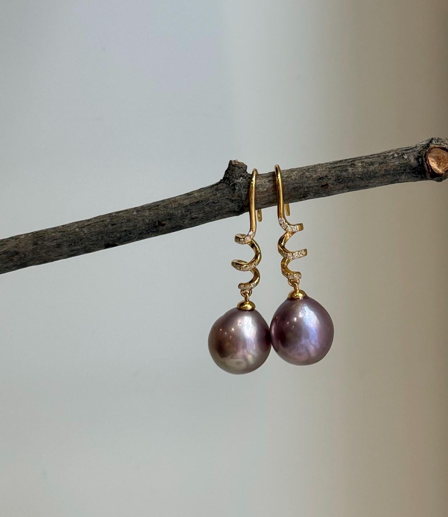 S925 sterling silver hook earrings featuring large genuine Edison pearls.