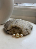 Luxury 18K gold pearl pendant featuring a unique combination of South Sea and Akoya pearls.