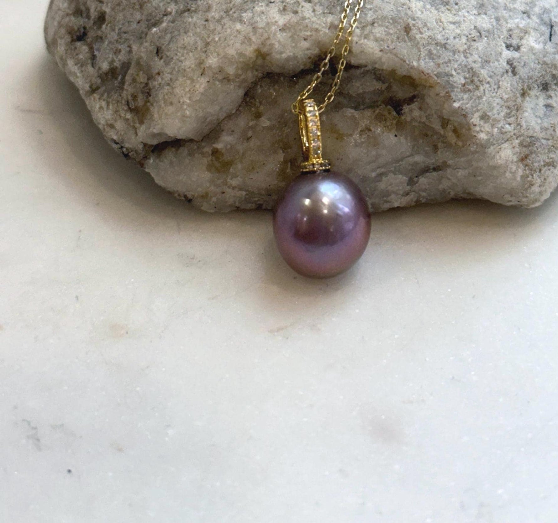 Elly’s 13.6mm Edison lavender rose pearl pendant with extreme mirror luster and S925 sterling silver setting.