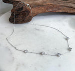 Five stone moissanite station necklace