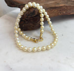 Extreme luster Akoya golden pearl necklace with sterling silver closure
